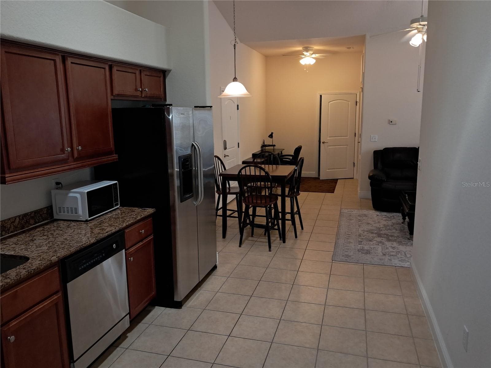 Kitchen to dinning to den - 1083 DAVID WALKER DR #C3, TAVARES