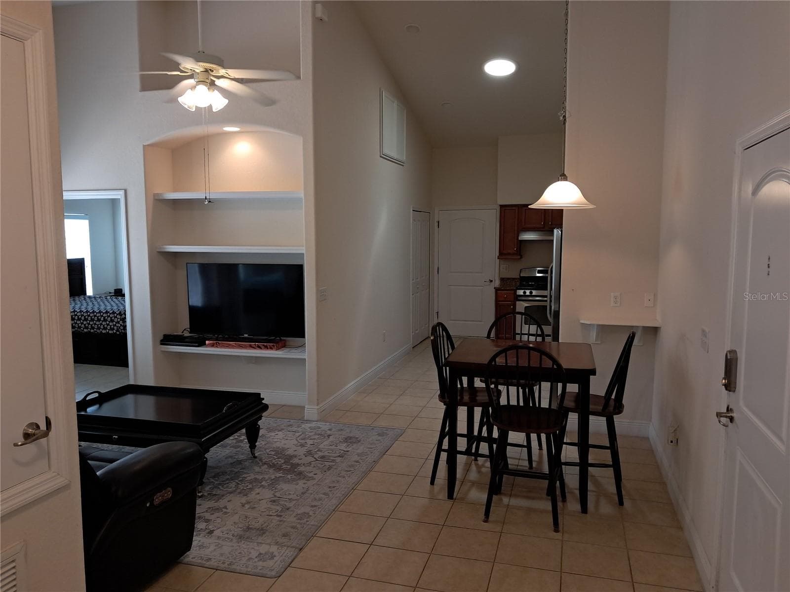 Den to dinning to kitchen - 1083 DAVID WALKER DR #C3, TAVARES