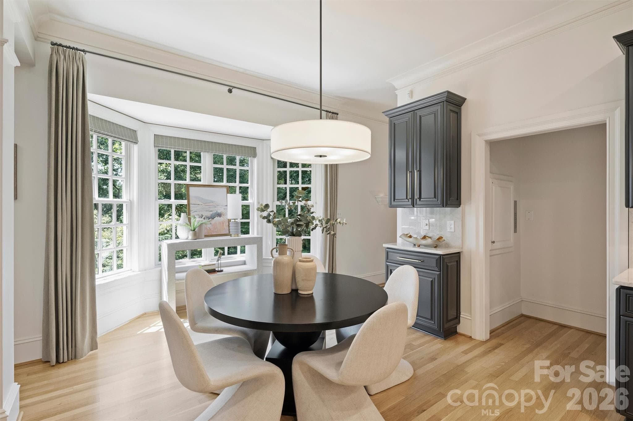 Breakfast Area with an abundance of light thanks to the large bay window. - 2115 Foxcroft Woods Lane, Charlotte