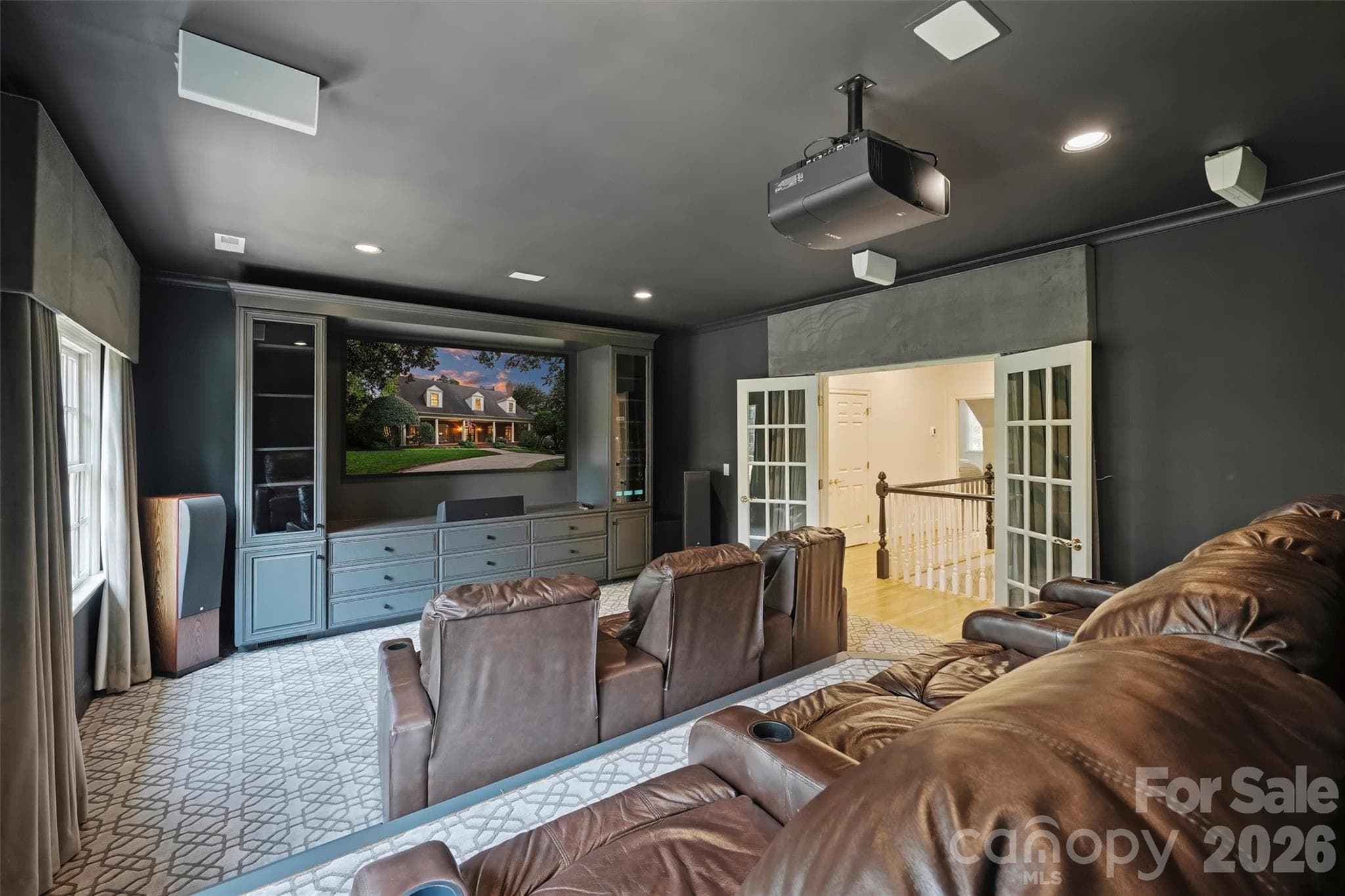 Theater Room for all the cinephiles out there. - 2115 Foxcroft Woods Lane, Charlotte