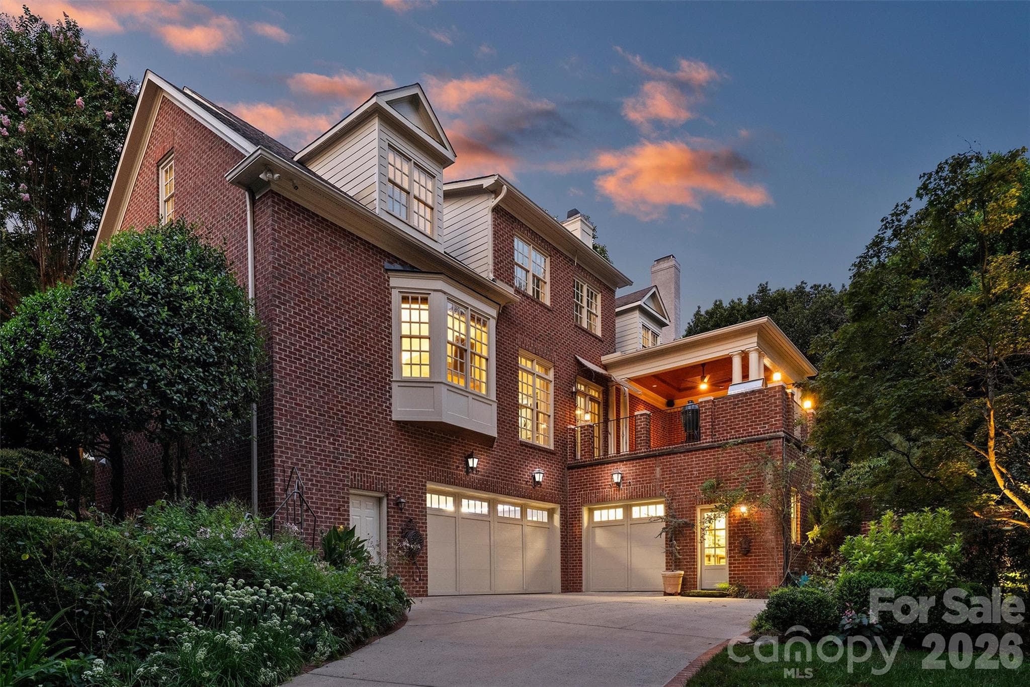 Back of home at twilight. - 2115 Foxcroft Woods Lane, Charlotte