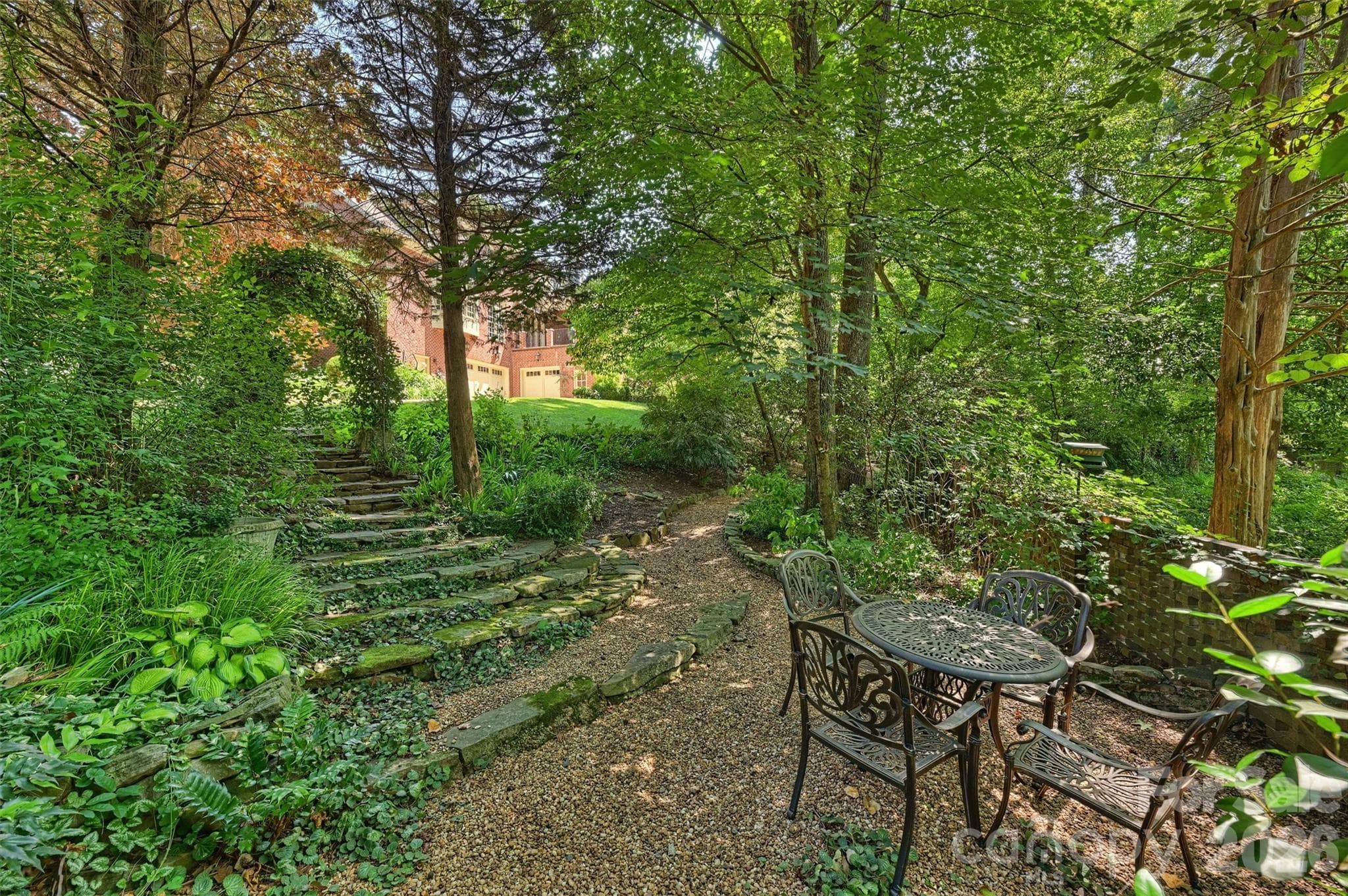 The privacy the back yard offers is next level. - 2115 Foxcroft Woods Lane, Charlotte