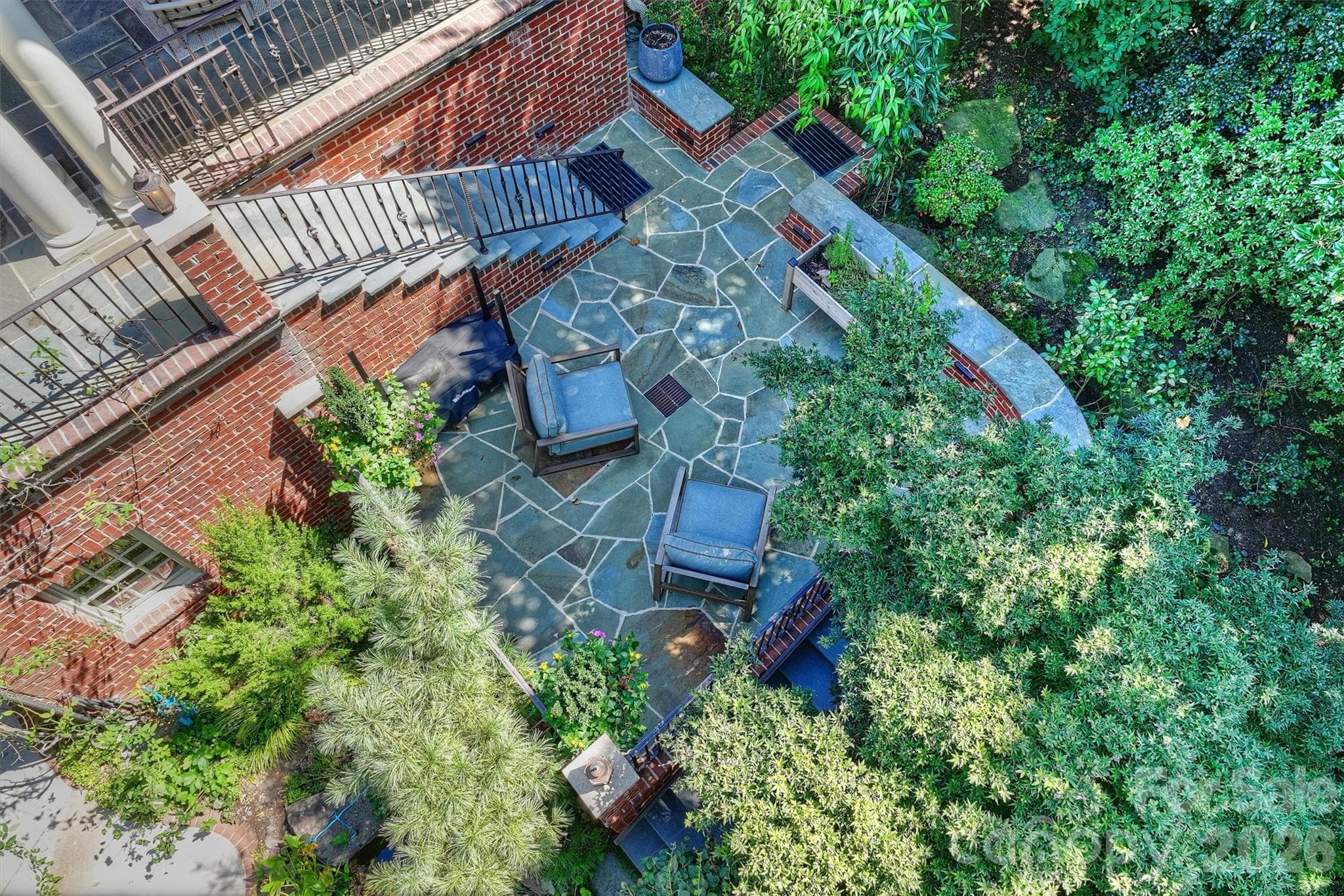 Terraced patio from above. - 2115 Foxcroft Woods Lane, Charlotte
