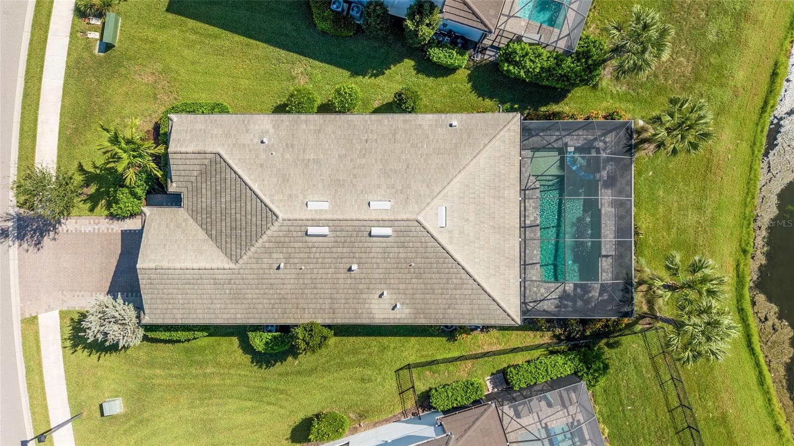 Aerial shot of the home and pool - 5755 BLUESTAR CT, LAKEWOOD RANCH
