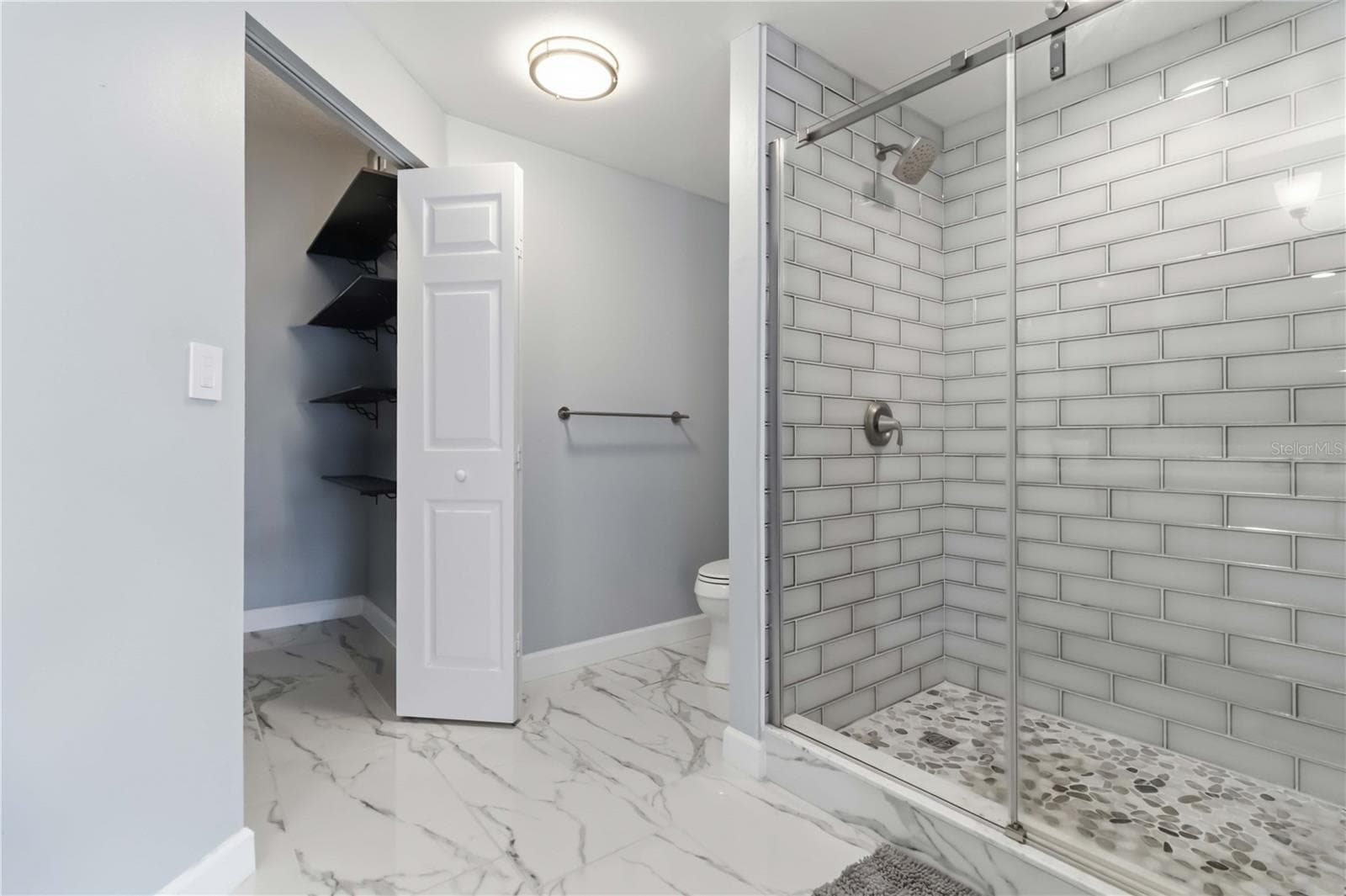 Redesigned Primary Bath - 5601 BENTGRASS DR #10-117, SARASOTA