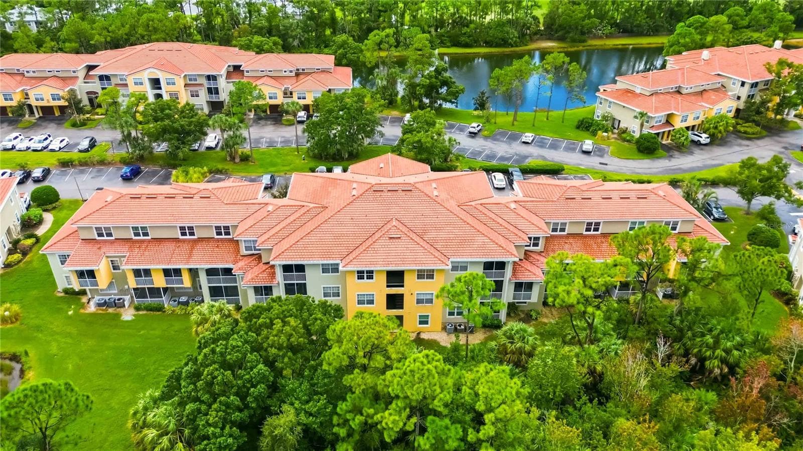 Back View with Pond and Preserves - 5601 BENTGRASS DR #10-117, SARASOTA
