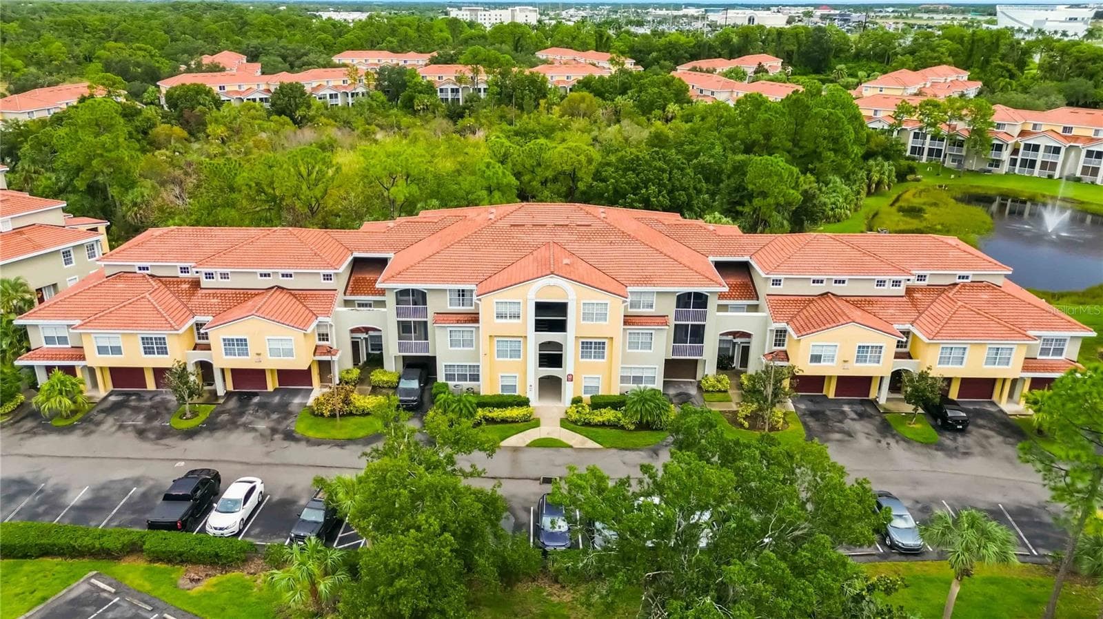Front View of Building - 5601 BENTGRASS DR #10-117, SARASOTA