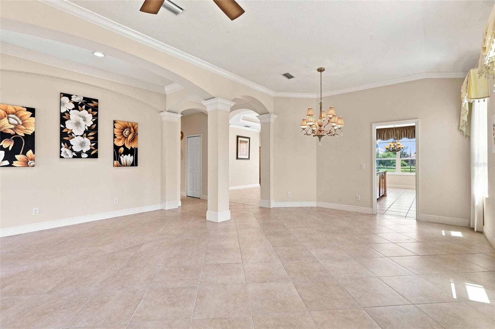 Open concept formal living and dining areas - 1328 THORNAPPLE DR, OSPREY
