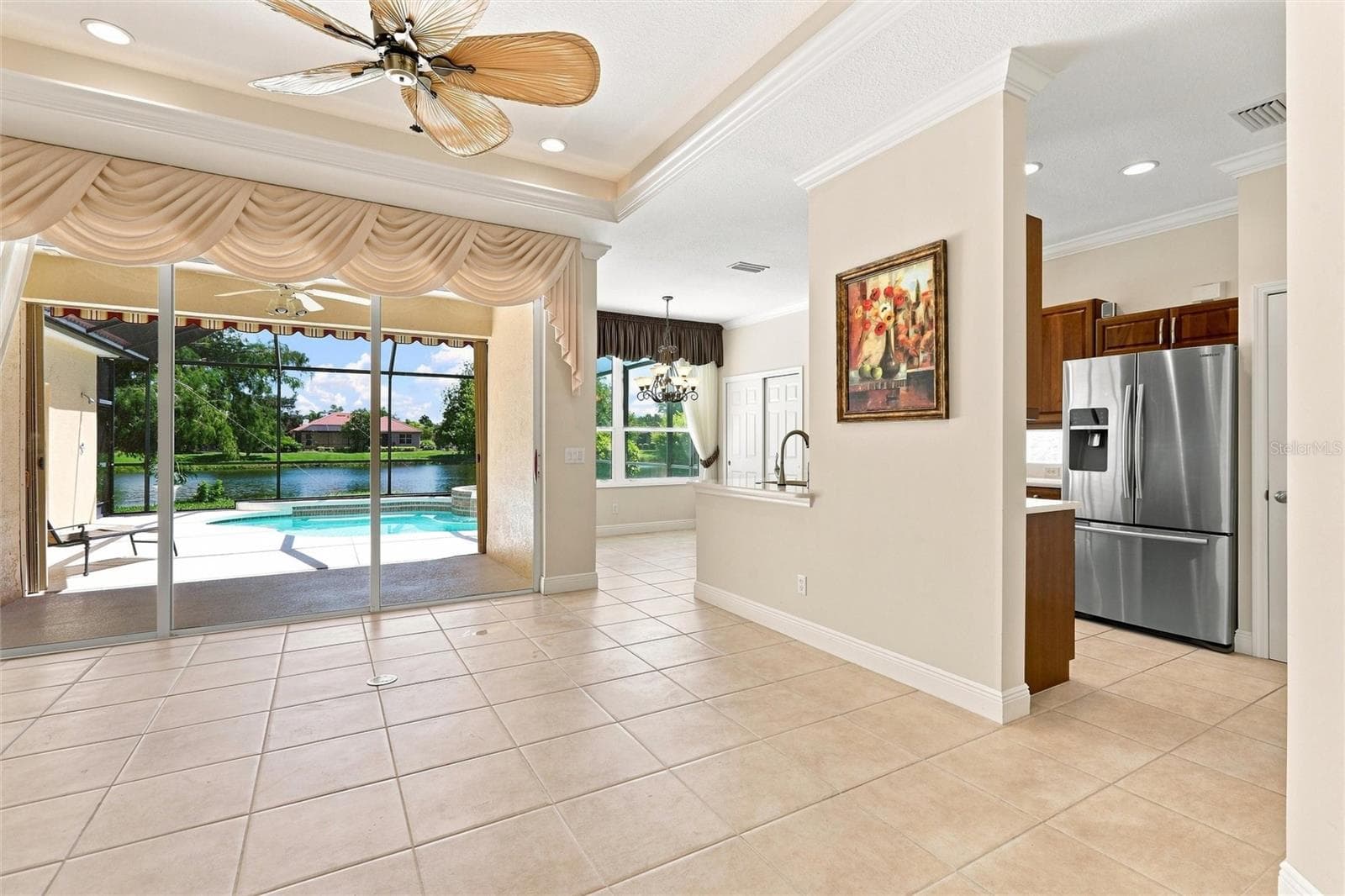 Family room out to lanai - 1328 THORNAPPLE DR, OSPREY