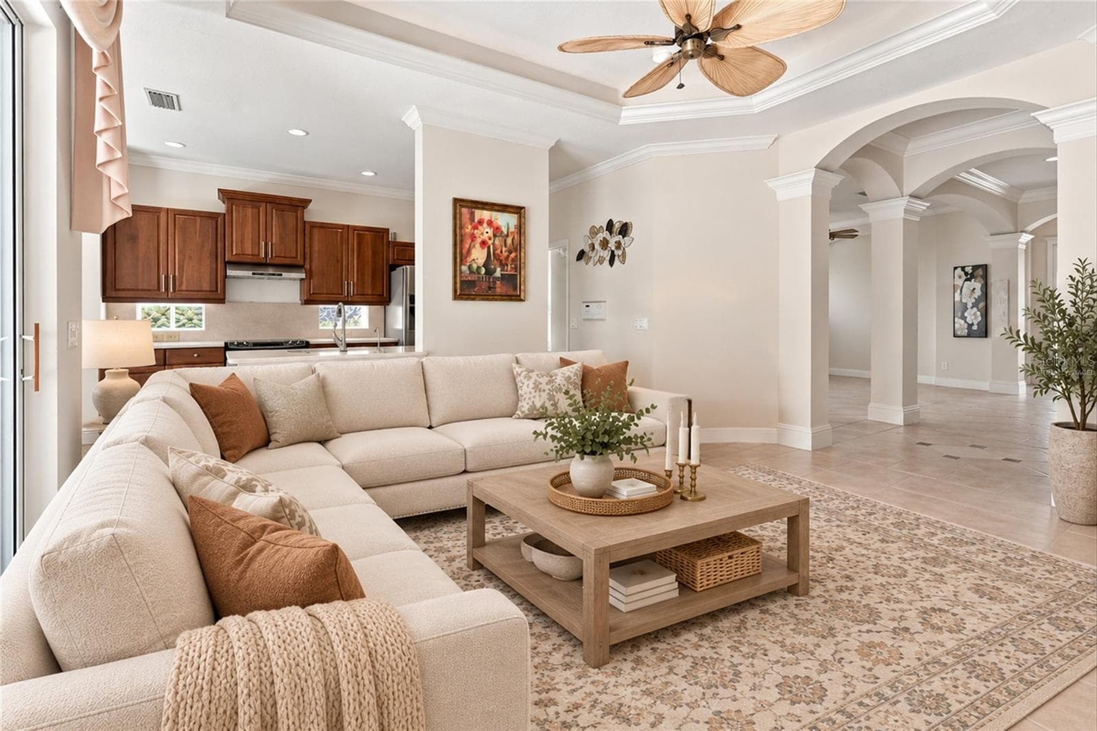 Virtually staged family room with view into kitchen - 1328 THORNAPPLE DR, OSPREY
