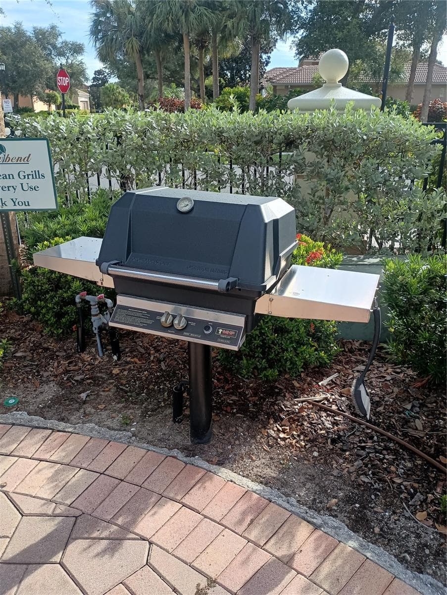 Grills on community pool deck - 1328 THORNAPPLE DR, OSPREY