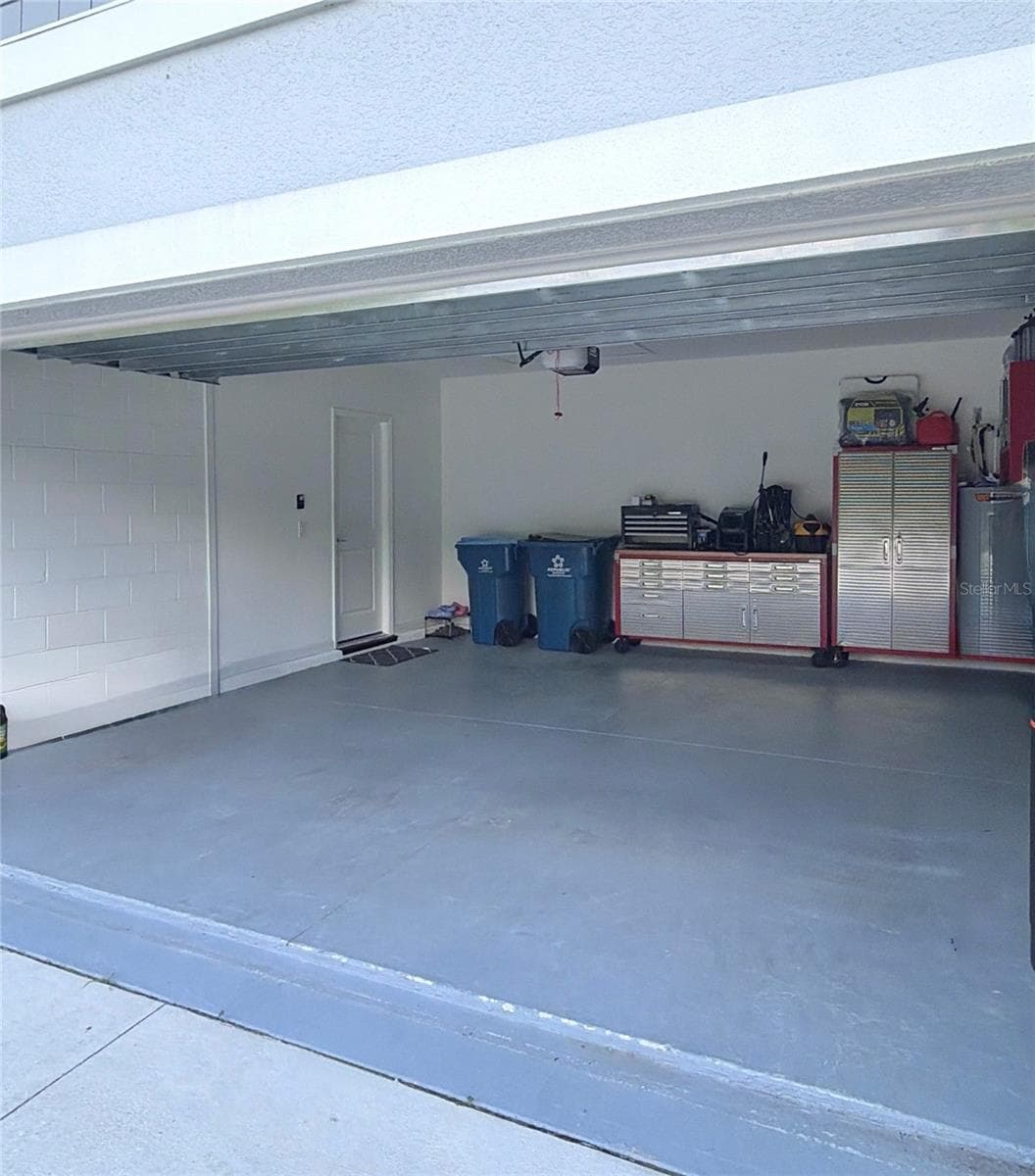 2 Car GarageFloor painted - 122 TINY FLOWER RD, DAVENPORT