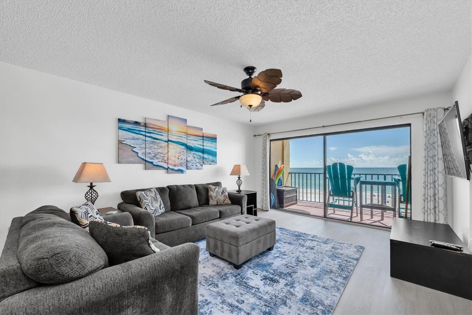 Large living room with balcony access and lovely views - 14710 GULF BLVD #206, MADEIRA BEACH