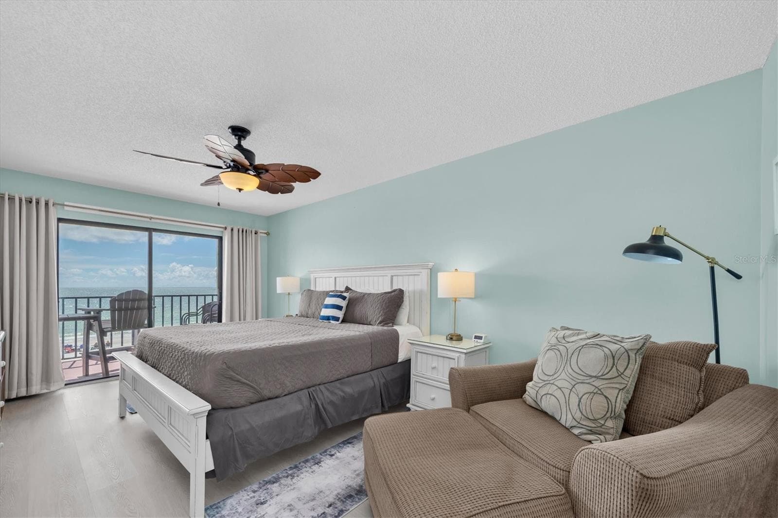 Primary bedroom with access to balcony with amazing views - 14710 GULF BLVD #206, MADEIRA BEACH