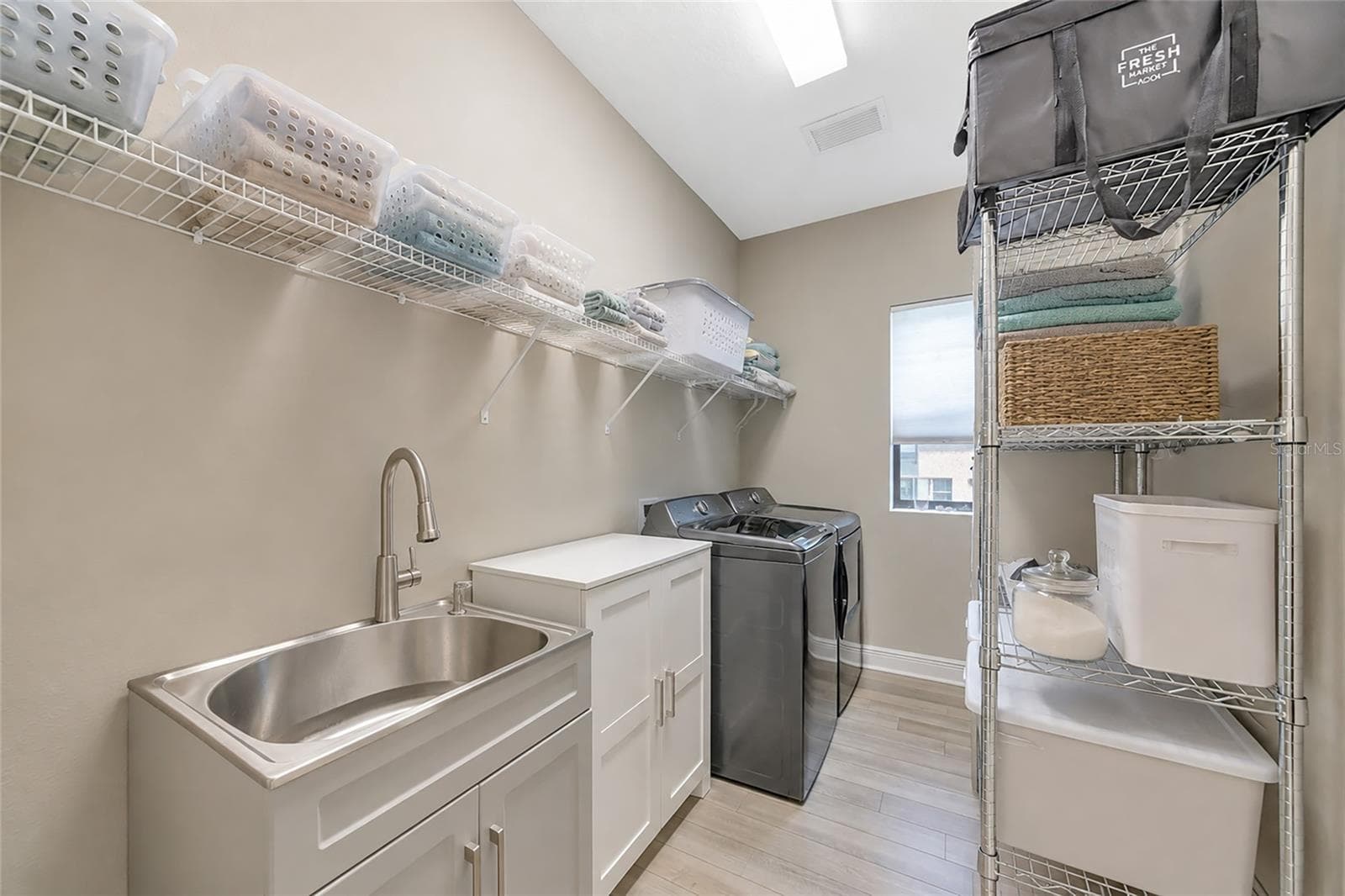 laundry room - 9211 ISABELLA CIR, PARRISH