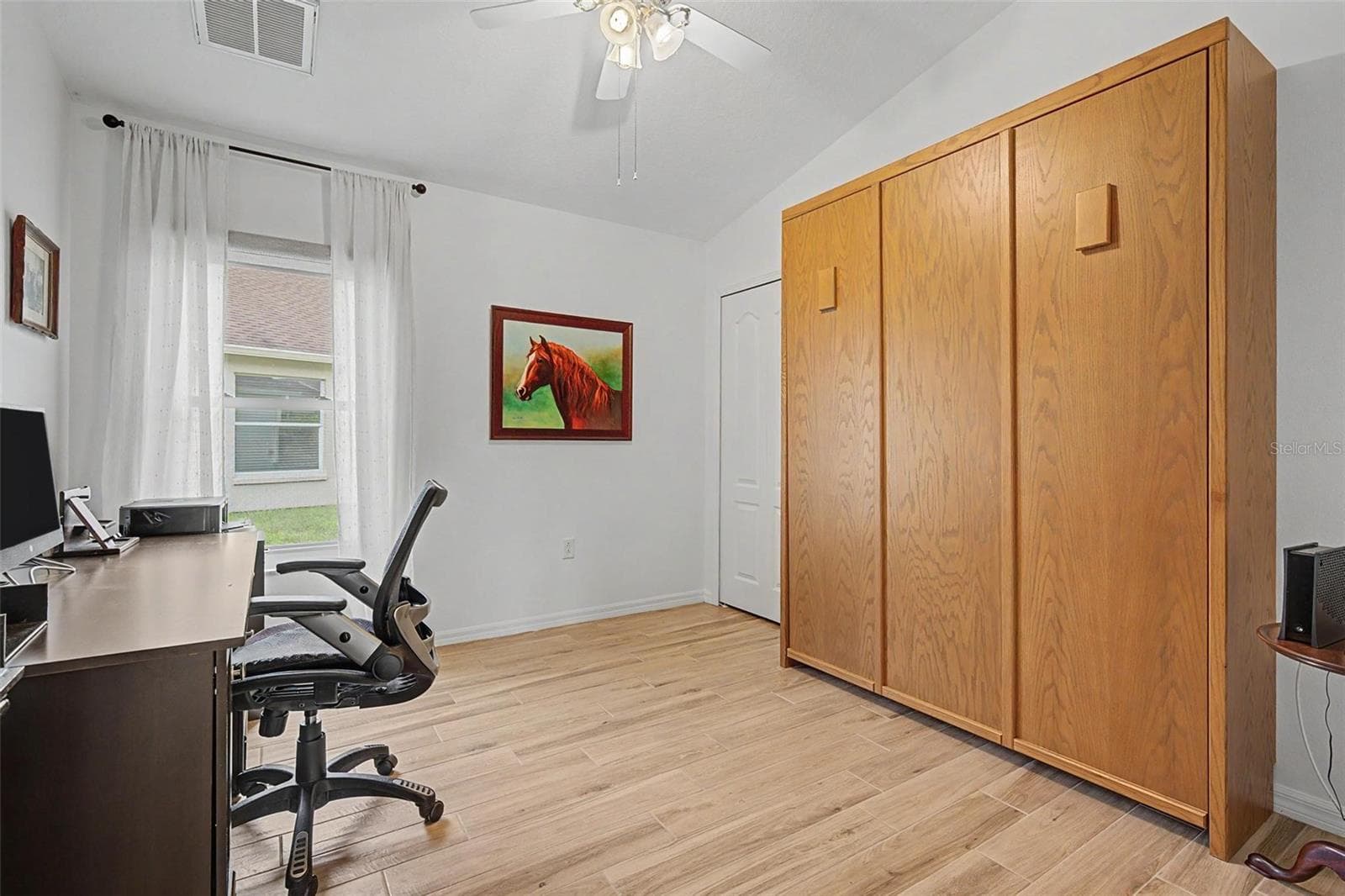 Bedroom 3 is being used as a home office - 12027 FERN TERRACE CT, TRINITY