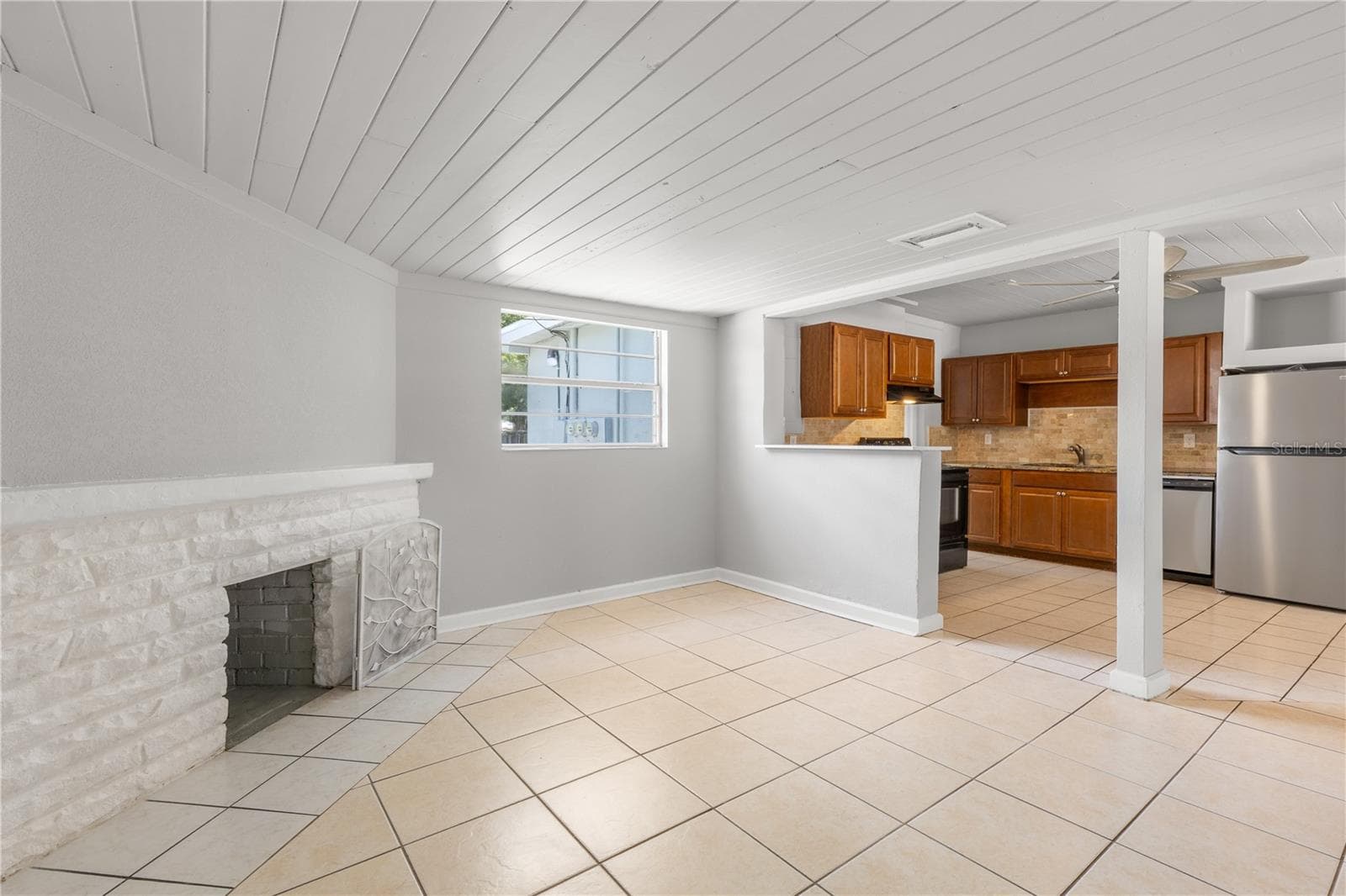 Unit 2 family room - 9845 60TH ST, PINELLAS PARK