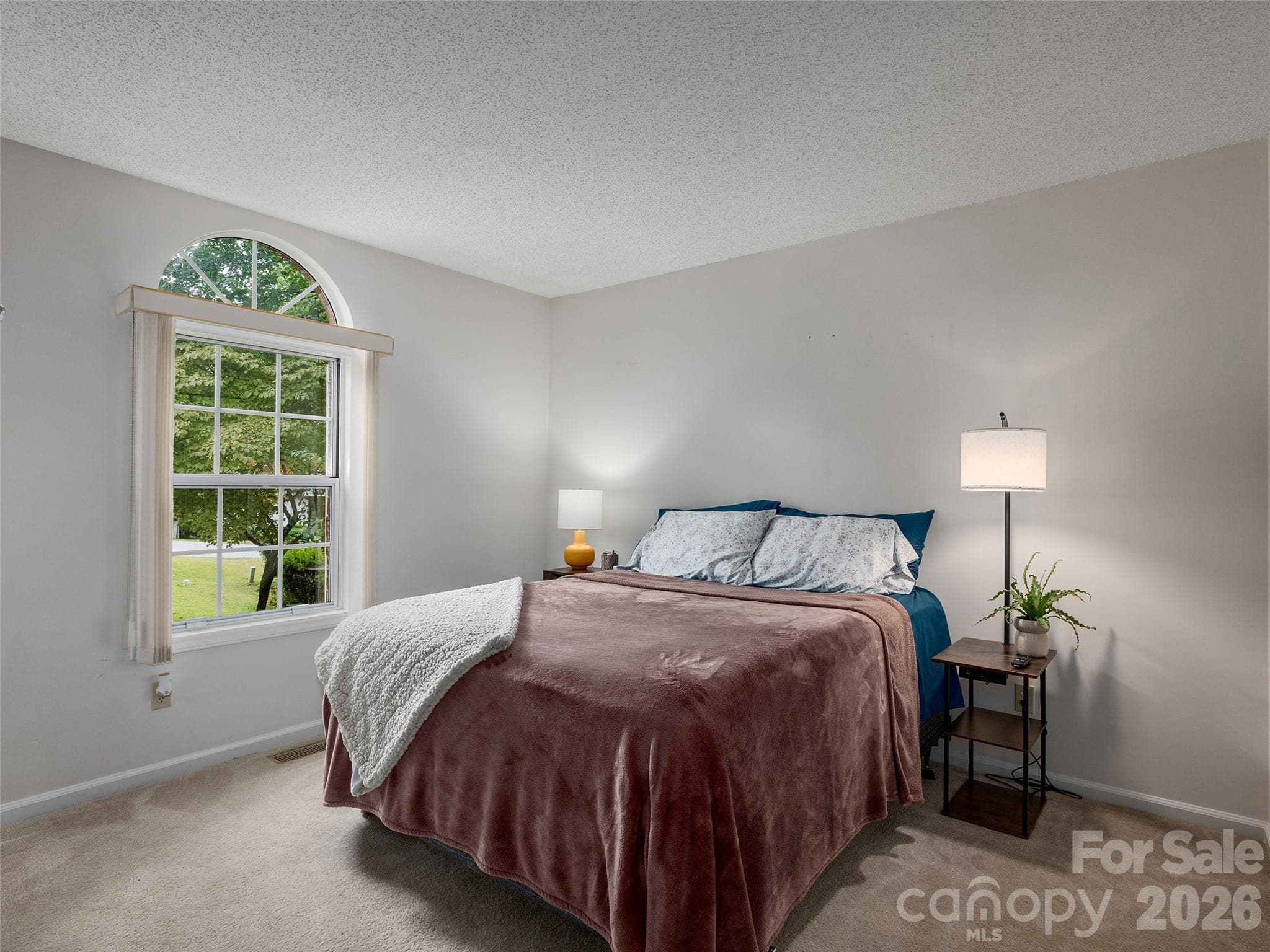 Comfortable second bedroom with natural light and flexible furniture placement - 5 St Andrews Drive, Etowah
