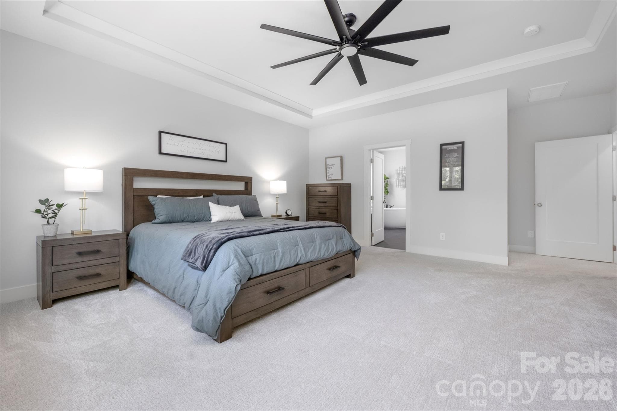 Primary bedroom with tray ceiling - 4320 Tournette Drive, Indian Land