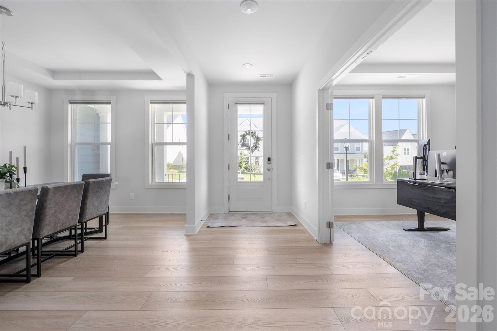 Foyer with luxury vinyl plank floors; dining room and office to either side - 4320 Tournette Drive, Indian Land