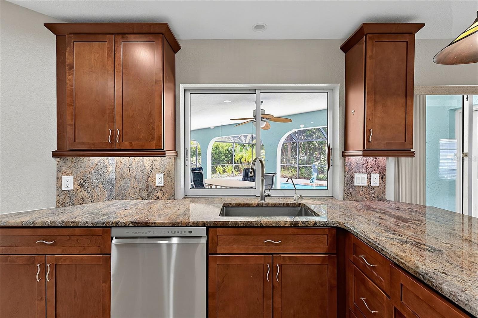 Large Pass Through Window to Lanai - 339 BARCELONA ST, PUNTA GORDA