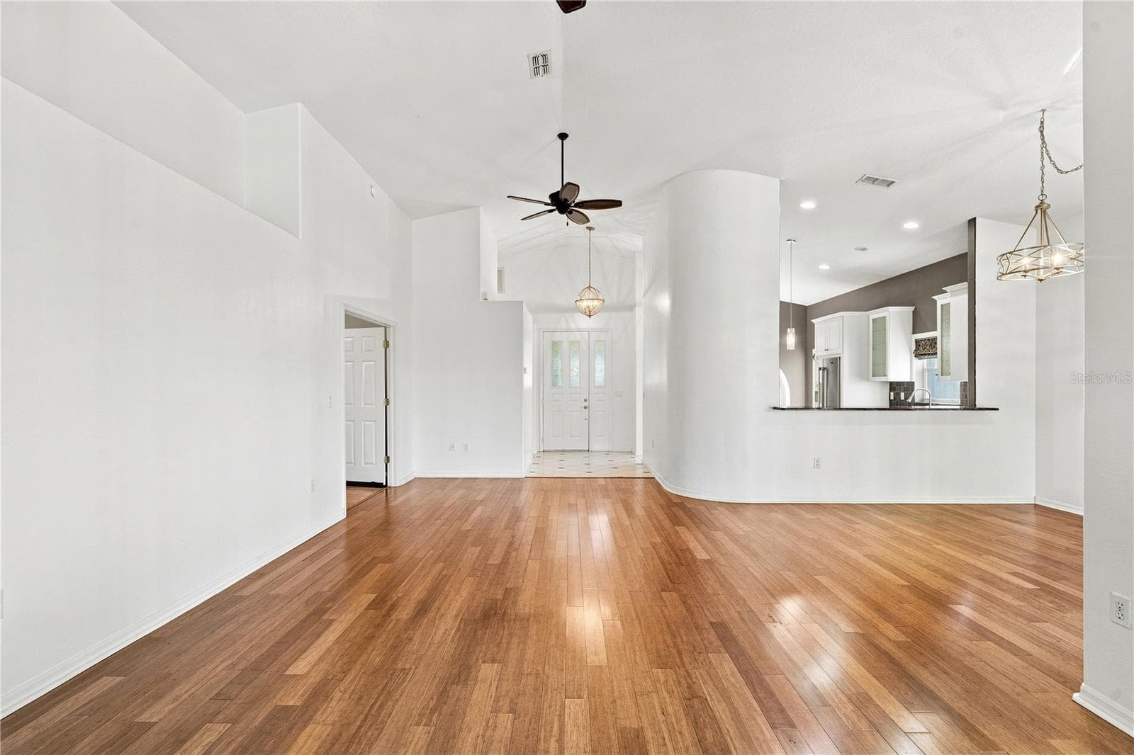 Living room Bamboo floors - 10097 HOLLY BERRY DR, WEEKI WACHEE