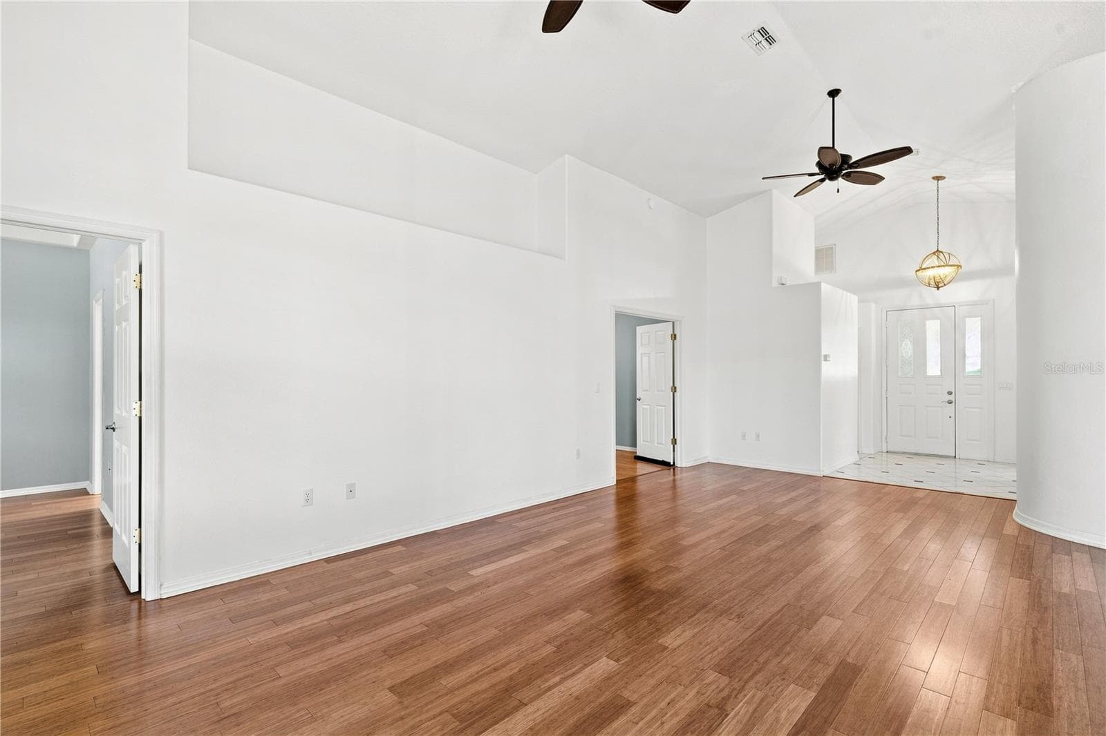 Living room Bamboo floors - 10097 HOLLY BERRY DR, WEEKI WACHEE