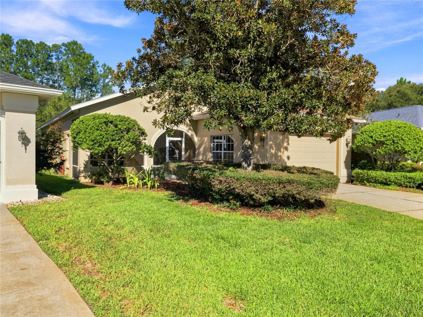 FRONT - 10097 HOLLY BERRY DR, WEEKI WACHEE