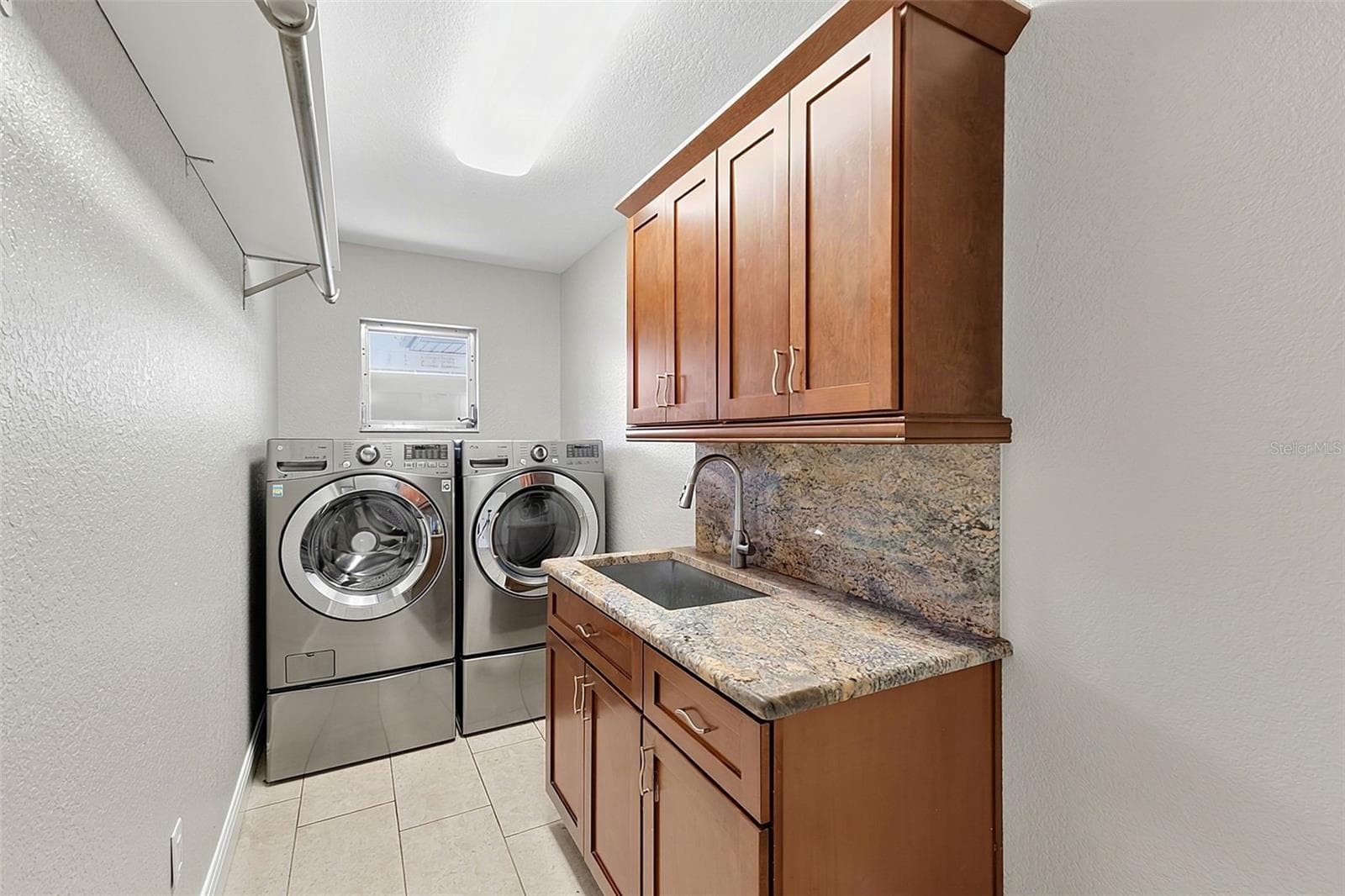 Laundry room with cabinets - 339 BARCELONA ST, PUNTA GORDA