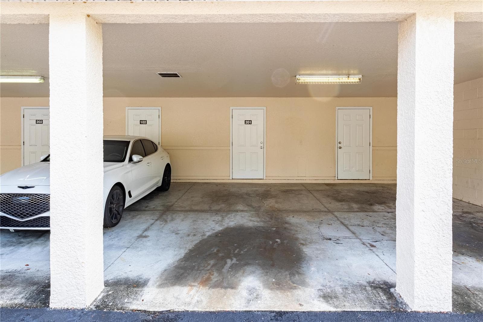 Carport and storage closet - 946 15TH ST #201, HOLLY HILL
