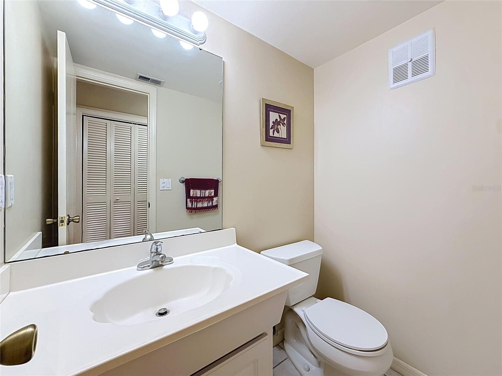Half bathroom on the 1st floor - 8830 DR MARTIN LUTHER KING JR ST N #UNIT 2B, ST PETERSBURG