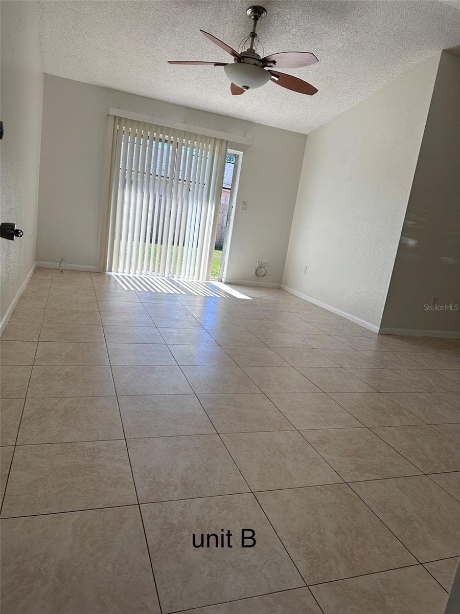 Unit B Living Room - 11316 WALSINGHAM RD, SEMINOLE