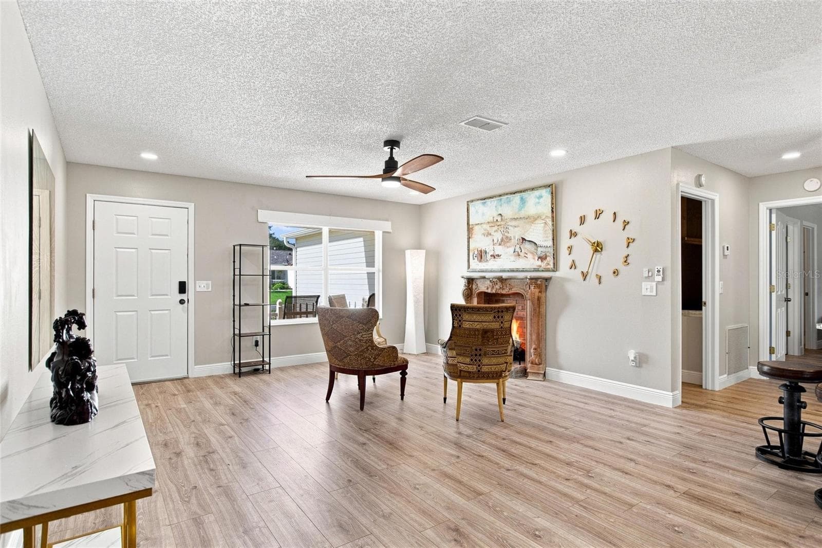 Luxury vinyl plank flooring, installed in 2024, gives the living area a cohesive look. - 2713 DE LA ROSA ST, THE VILLAGES