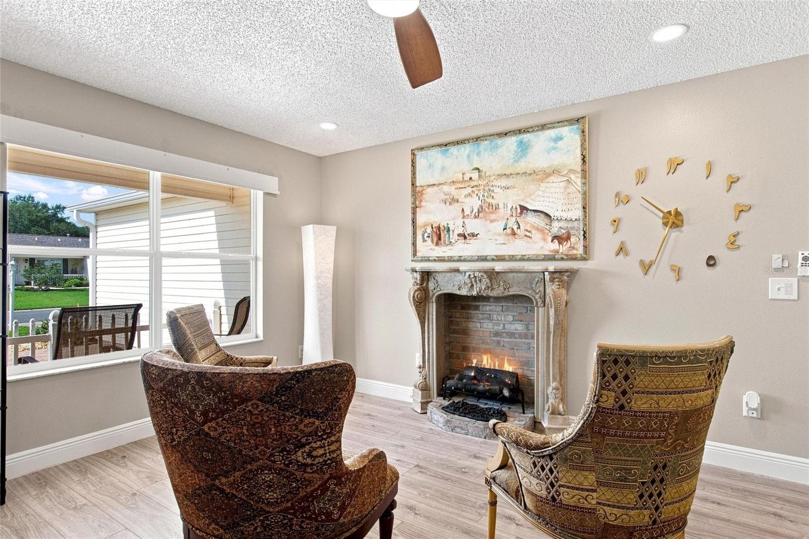 A bright sitting area offers a comfortable place to unwind after a day of community activities. - 2713 DE LA ROSA ST, THE VILLAGES
