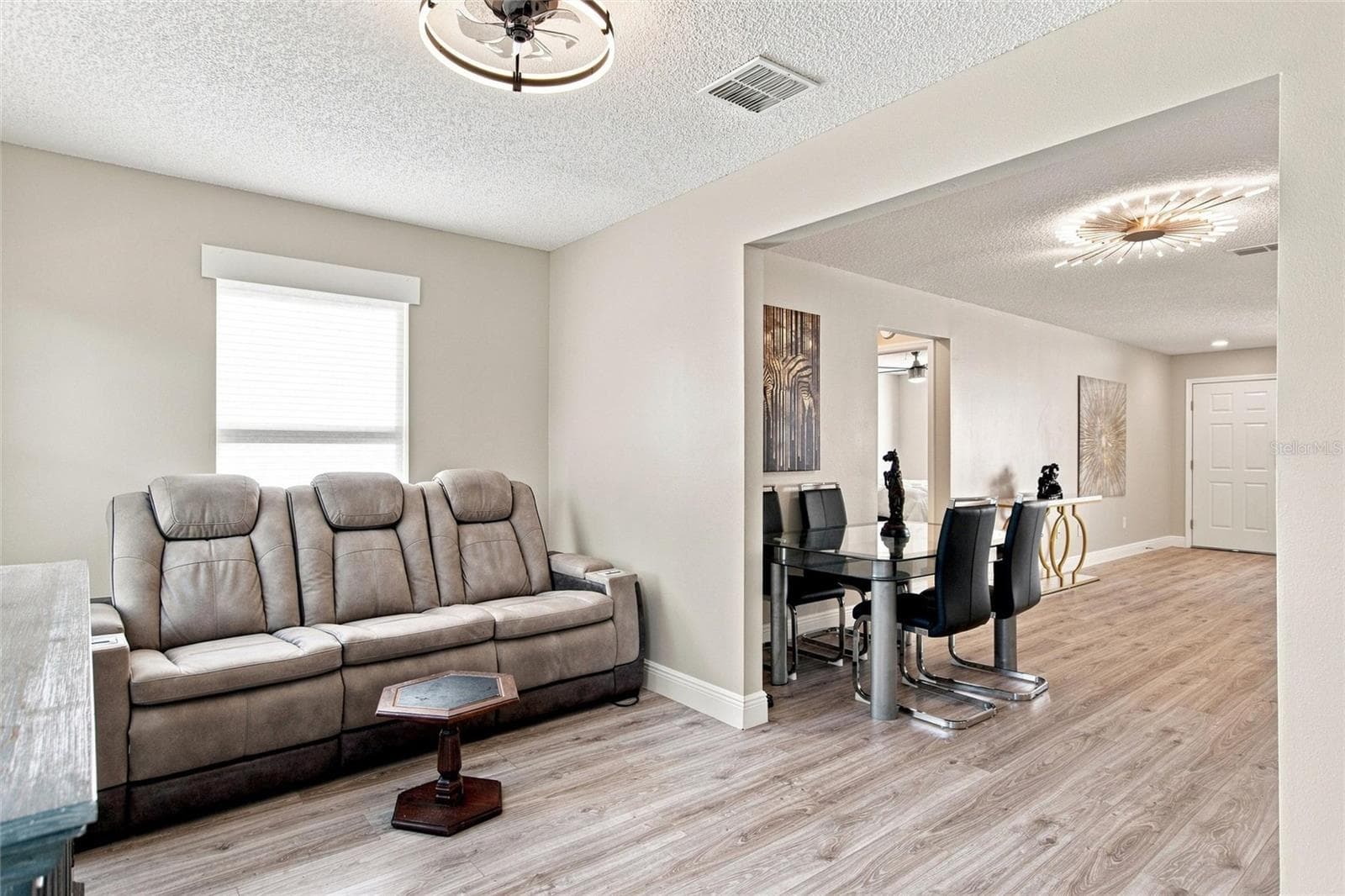 An additional sitting area stays connected to the dining room while offering room to spread out. - 2713 DE LA ROSA ST, THE VILLAGES