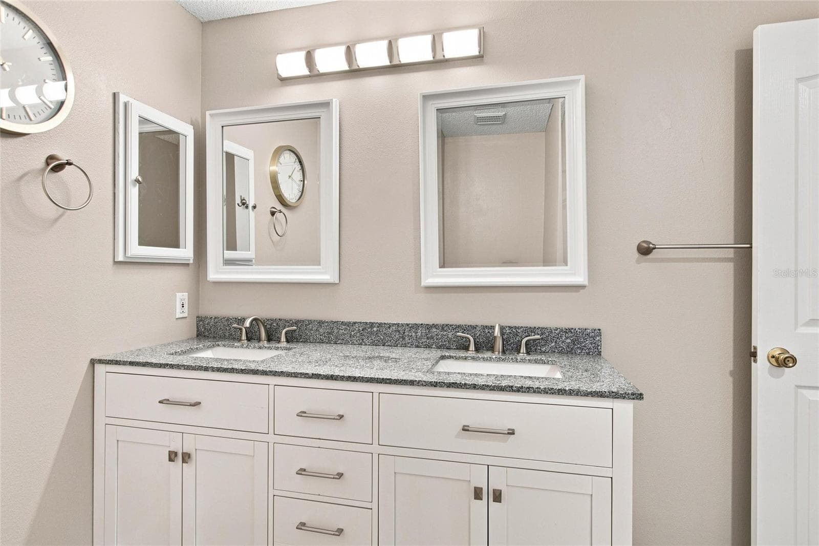 Dual-sink vanity offers ample counter space and storage for everyday convenience. - 2713 DE LA ROSA ST, THE VILLAGES