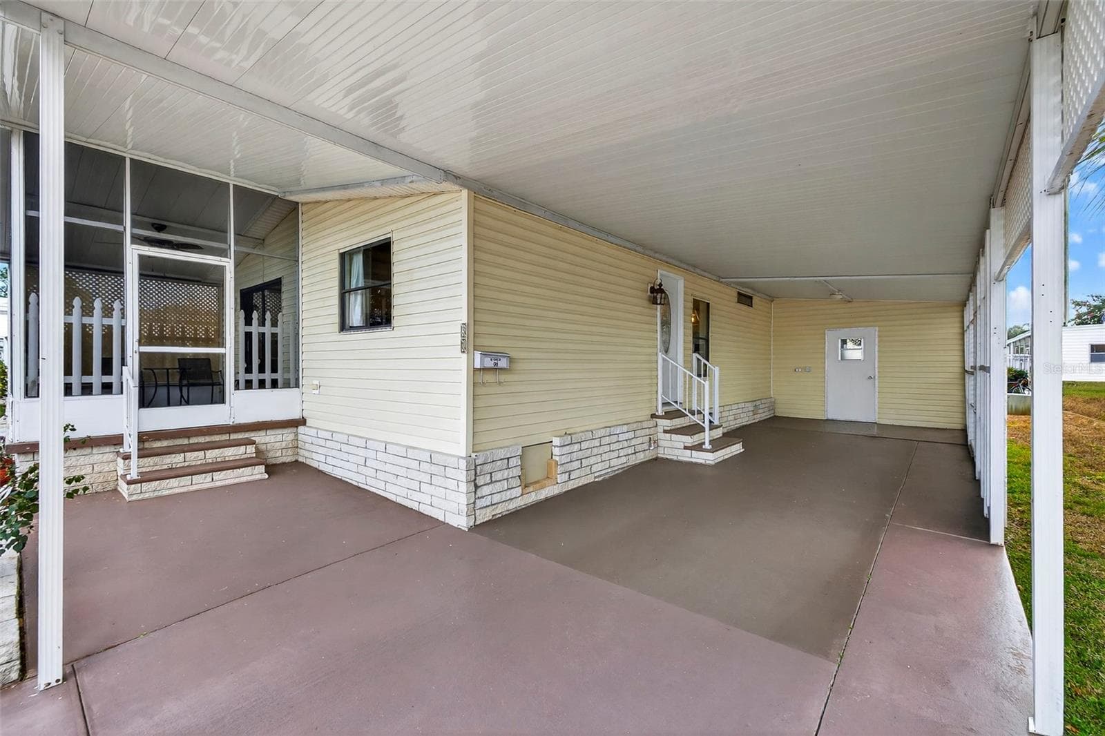 Large 3 car tandem carport - 7880 54TH AVE N #38, ST PETERSBURG