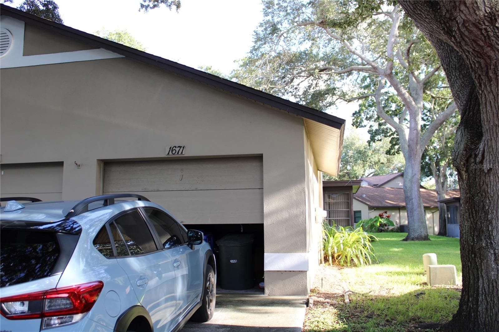 Private garage with electric door opener. - 1671 HAMILTON CT #2102, DUNEDIN
