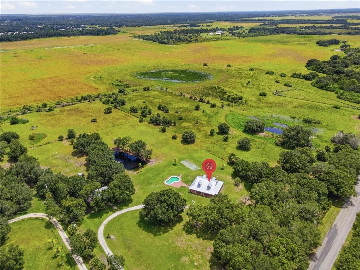 Single Family Residence at 1777 POLLYWOG CROSSOVER RD, LABELLE, photo 10 of 27