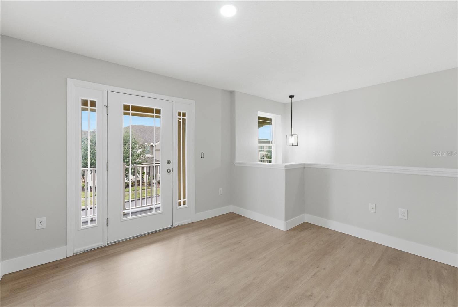 Versatile upstairs loft with new vinyl plank flooring and direct access to the private balcony. - 2615 GIARDINO LOOP, KISSIMMEE