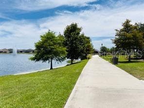 Scenic community walking trail along the lake. - 2615 GIARDINO LOOP, KISSIMMEE