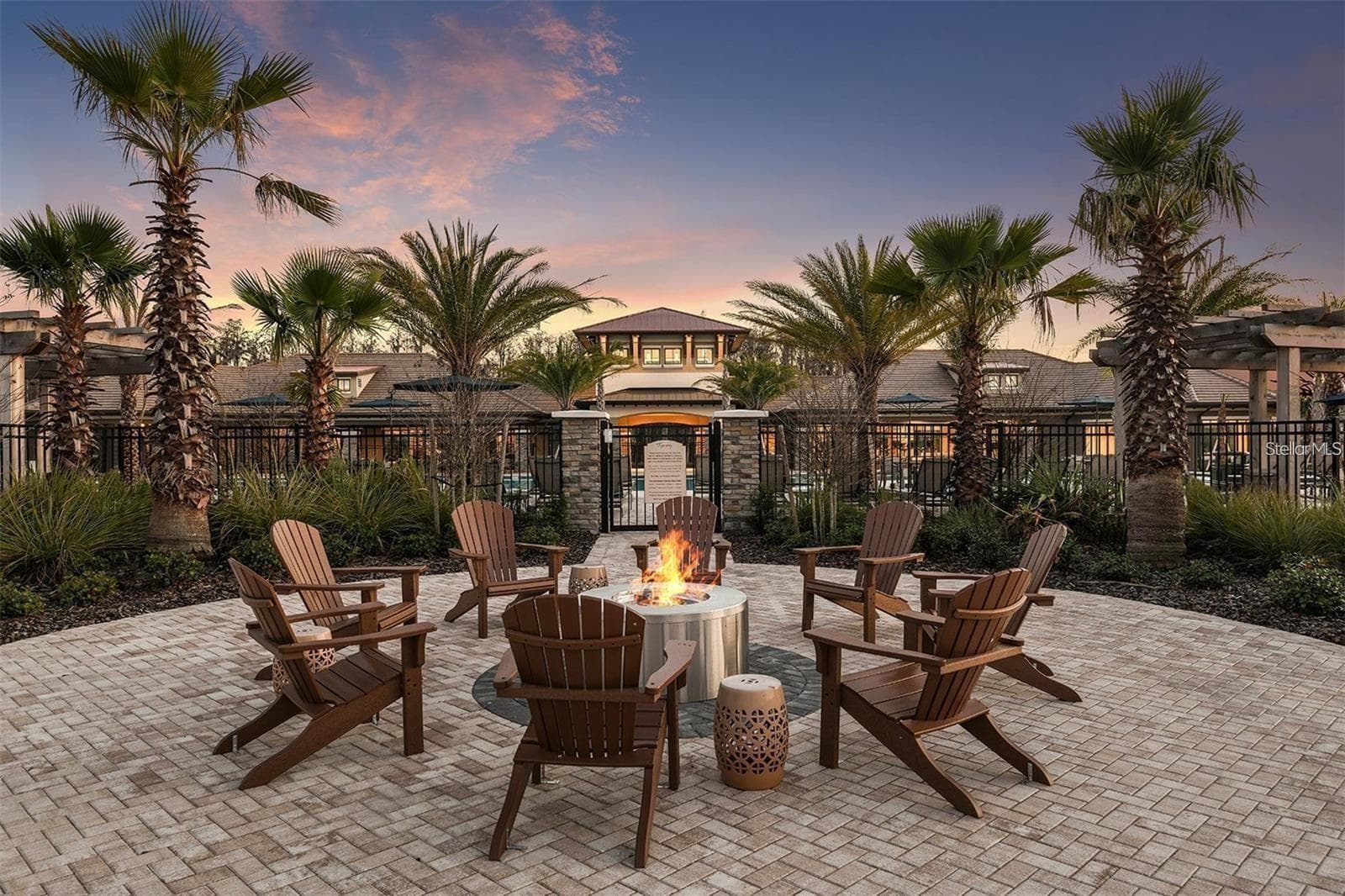 Inviting community fire-pit lounge—perfect for relaxing and gathering with neighbors. - 2615 GIARDINO LOOP, KISSIMMEE