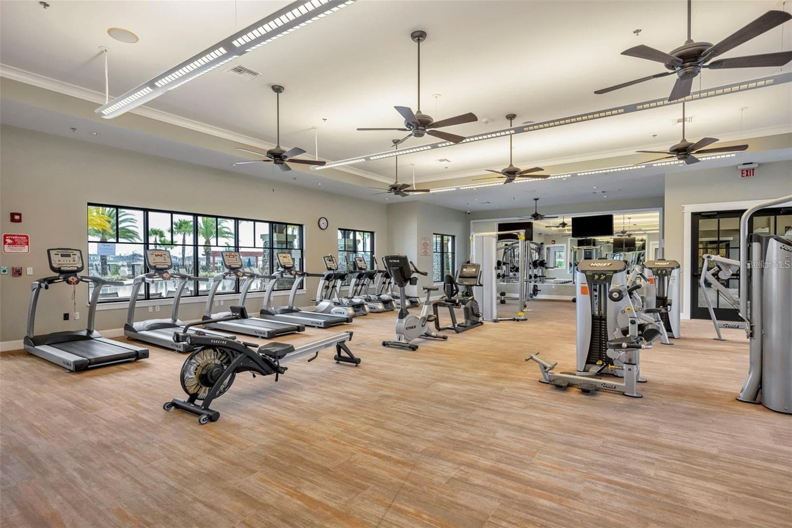 Fully equipped community fitness center with cardio and strength-training equipment. - 2615 GIARDINO LOOP, KISSIMMEE