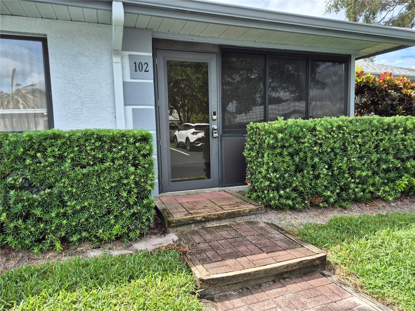 Patio Entrance - 2721 COUNTRYSIDE BLVD #102, CLEARWATER