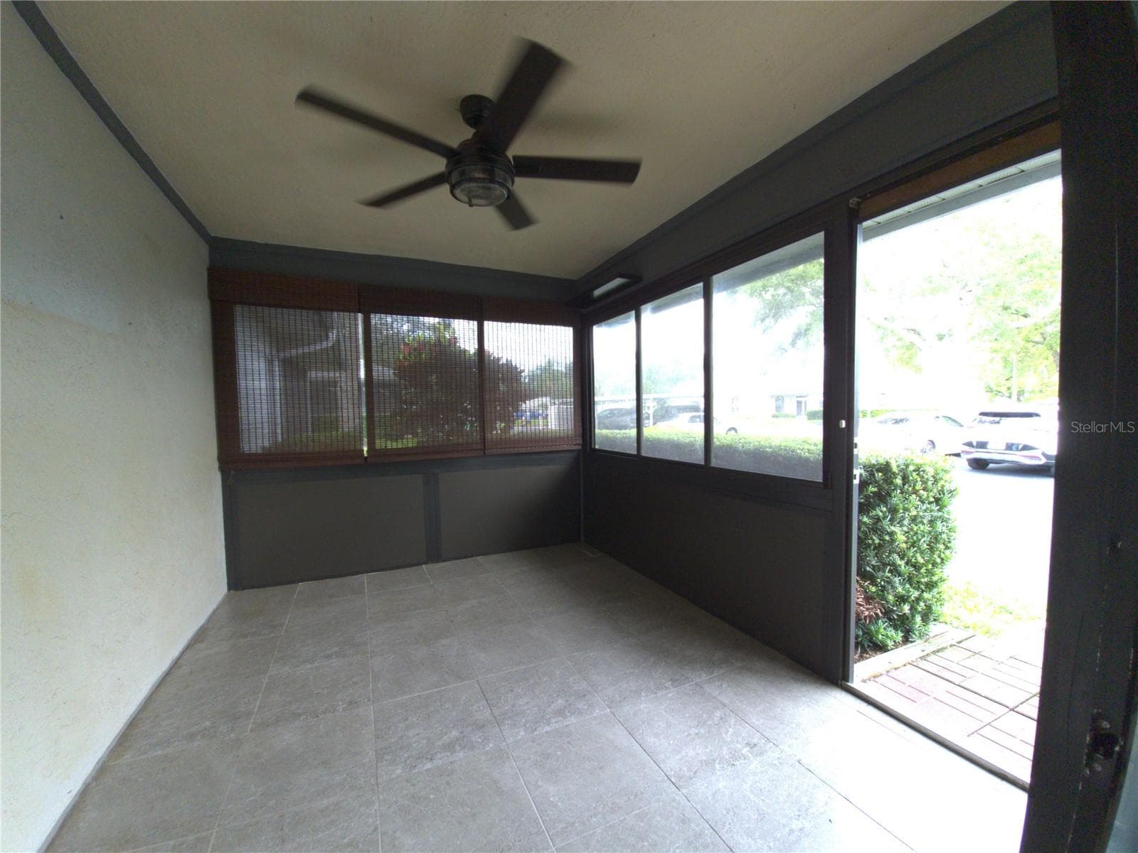 Enclosed Patio - 2721 COUNTRYSIDE BLVD #102, CLEARWATER
