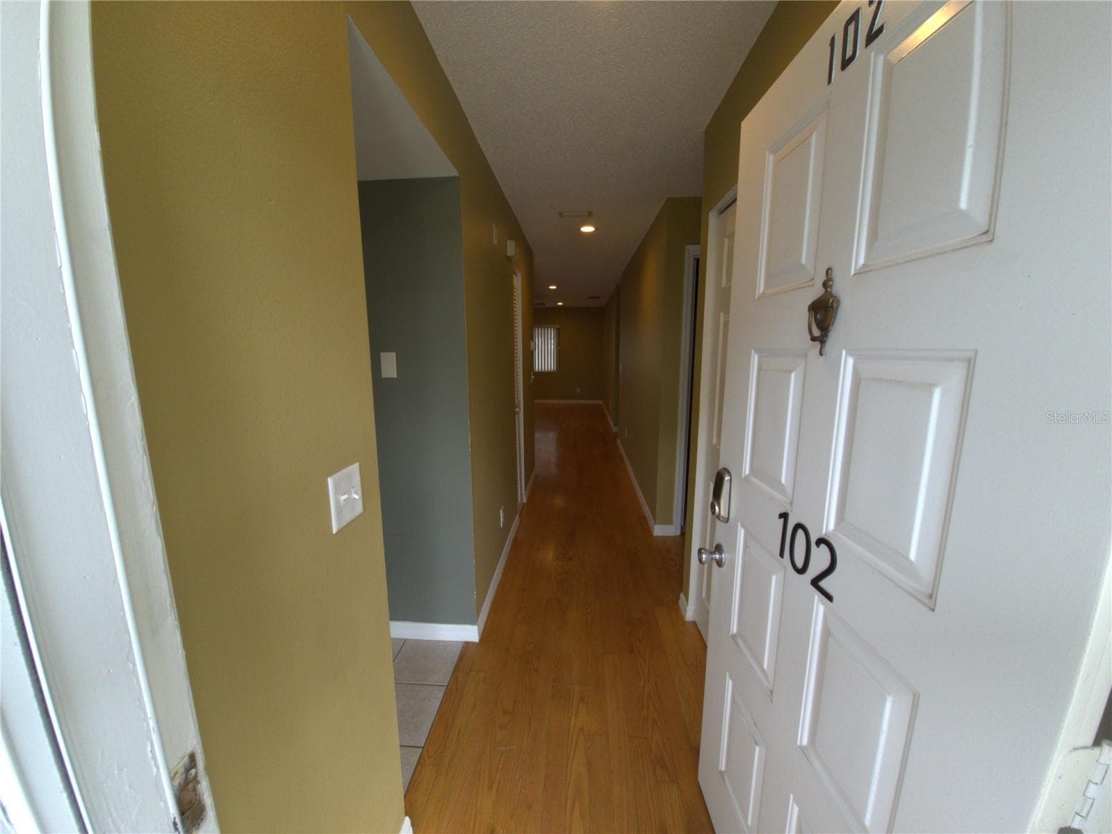 Front Door Entrance - 2721 COUNTRYSIDE BLVD #102, CLEARWATER