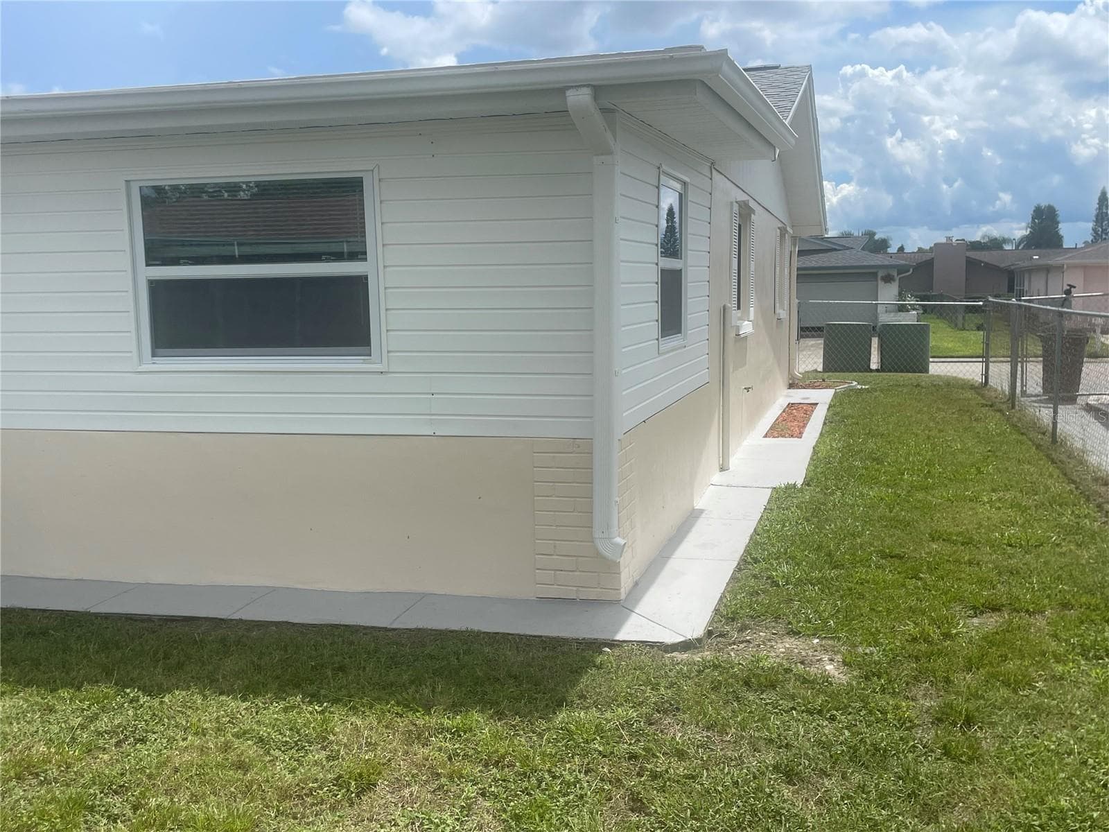 OTHER SIDE OF HOUSE - 7025 CUTTY SARK DR, PORT RICHEY