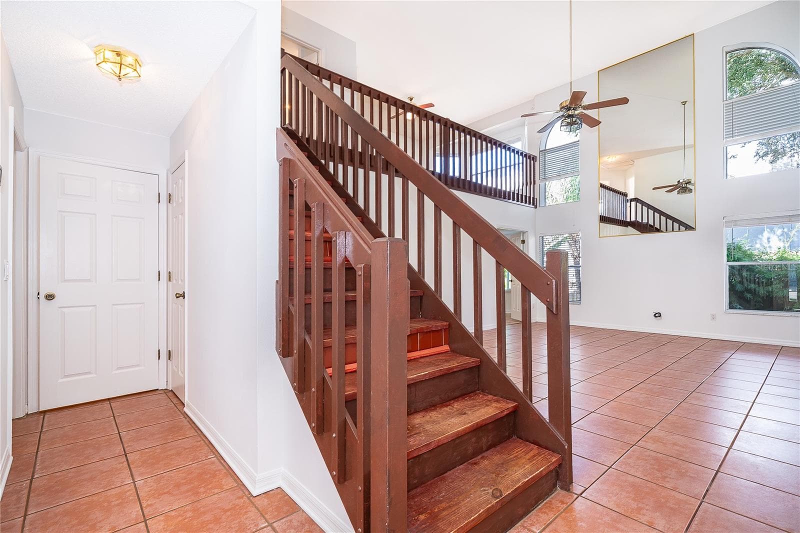 Welcoming Foyer, Opening to the Living Room With Soaring Ceilings! - 696 REMINGTON OAK DR, LAKE MARY
