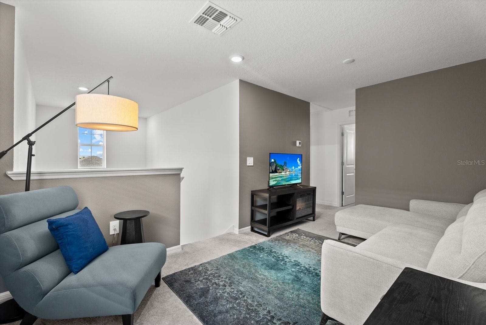 Spacious second-floor loft conveniently located near the bedrooms. - 8431 BELLA MAR TRL, PARRISH
