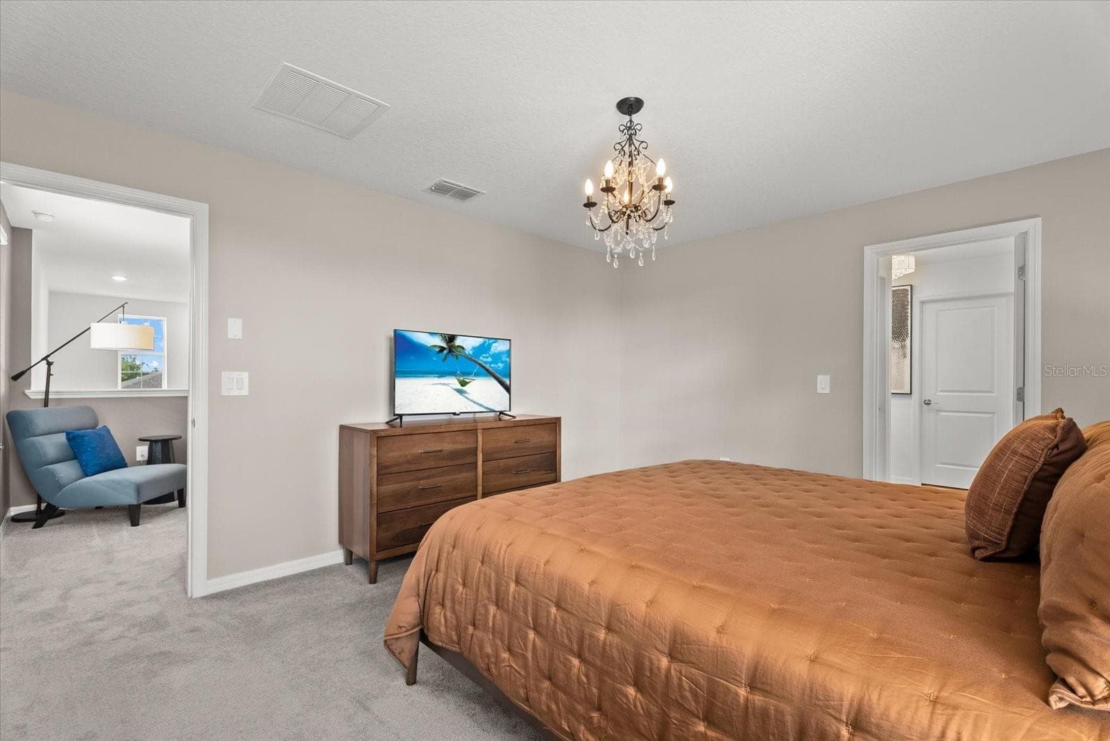 Primary suite with ample space for a full bedroom furniture set. - 8431 BELLA MAR TRL, PARRISH